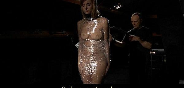 Charlize is wrapped with cellophane and tormented